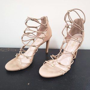 Strappy, Nude Anne Michelle heels with goldtone & rhinestone accents